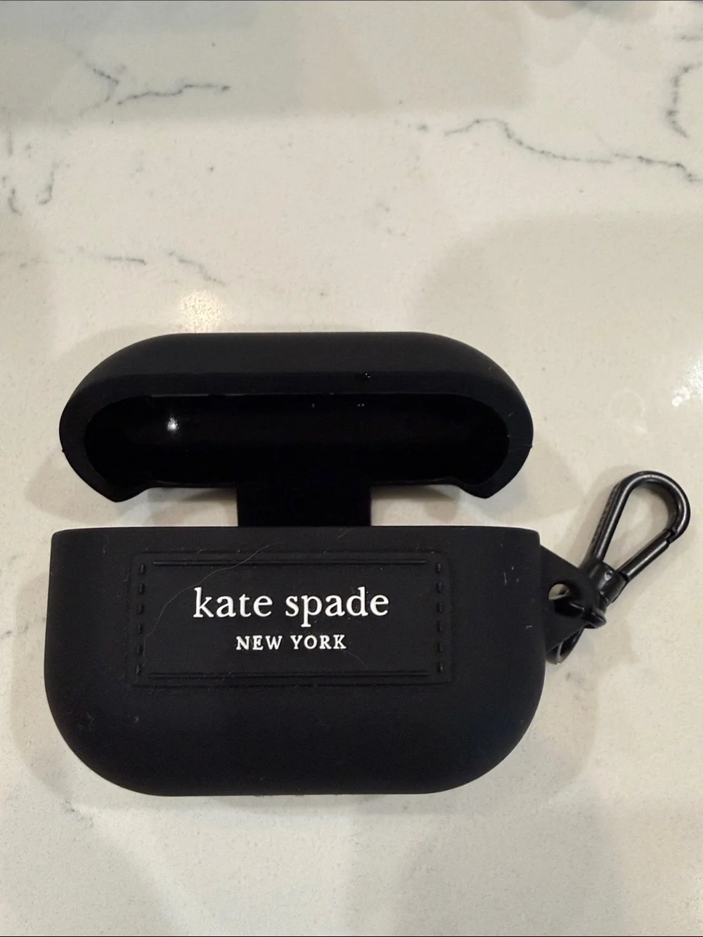 Apple AirPods Pro with MagSafe Charging Case + Kate Spade Black Silicone Case